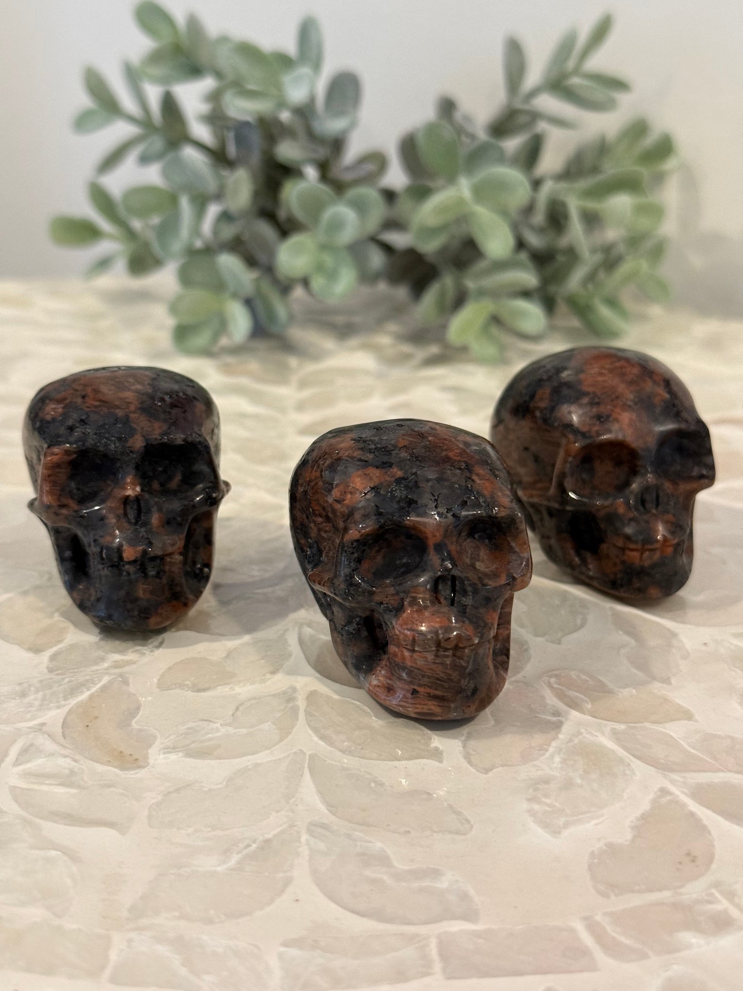 Red Larvikite Skulls
